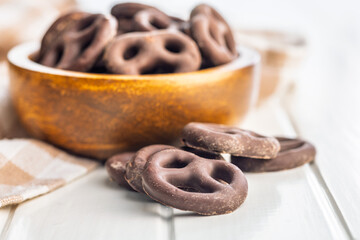 Chocolate covered pretzels in bowl.