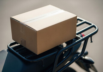Cardboard Delivery Box on Scooter Rack
