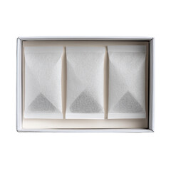 White gift box holds three small, triangular tea bags