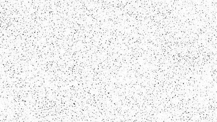 Black and white stipple dot grain texture overlay for grunge effect or abstract background. Halftone noise pattern for graphic design.