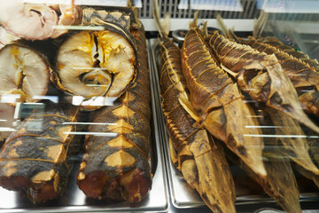 Fish market in Astrakhan. Display case with smoked delicacies: sterlet and sturgeon.