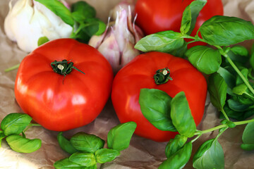 large tomatoes with basil and garlic
