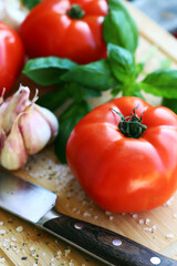 large tomatoes with basil and garlic