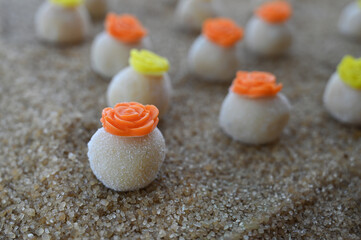 white brazilian brigadeiro party candy, sweet gourmet bonbon for celebrations, traditional handmade dessert close up, confectionery texture and details

