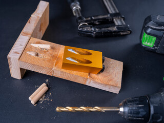 View of the workbench with accessories and tools for joining wood.