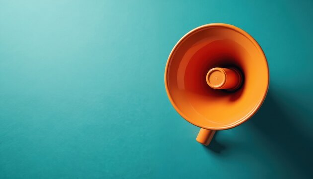 Top view shows orange megaphone on teal backdrop. Loudspeaker stands for attention grabbing in marketing. Equipment broadcasts communication. Horn voice delivers information to audience. Digital - Powered by Adobe