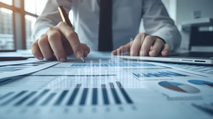 Businessman analyzing profit and quality management concepts long term cost planning, product quality, budgeting, financial forecasting, and company revenue and expense projections © who8mypnuts