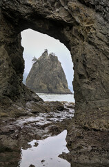 Rock arch sea stack formation along Pacific coast
