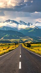 Naklejka premium Winding road leading to mountains