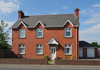 Editorial use only; a red brick two story house, with gable, taken at Longford, Ireland on August 6th, 2017.