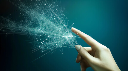 Hand interacting with dynamic blue particle network visualization. Digital transformation concept showing finger touching exploding data points against deep turquoise technological background.