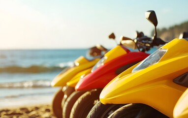Fototapeta premium Close up colorful quad bikes vehicles on sandy beach in sunny day