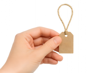 A hand holding a blank price tag, ready for customization