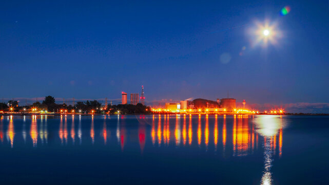 blue hour at Pickering Nuclear Power Plant with full moon 