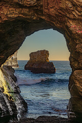 Sunset through the cave at Shark Fin Cove, Santa Cruz, California