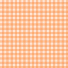 Orange and white checkered gingham pattern. Autumn plaid pattern background. Tartan orange maple fall themed design. Perfect for tablecloth, fabric, picnic design, and rustic background style.