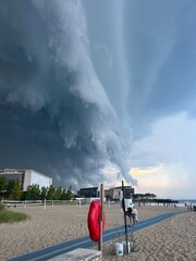 Before the storm, beach and life buoy, 