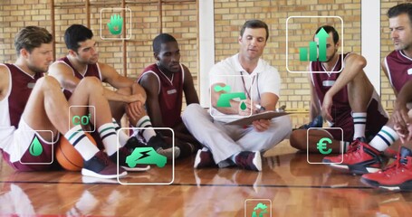 Basketball coach drawing play diagrams on clipboard and guiding seated team via offensive strategy - Powered by Adobe