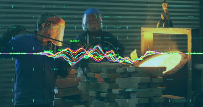 Upon senior worker pointing to waveform junior worker inserting sampling rod into foundry furnace