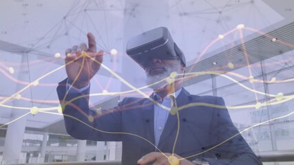 Businessman wearing VR headset lifting hand sweeping lines and pinching nodes optimizing data flow - Powered by Adobe