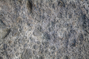 Breccia is a rock composed of large angular broken fragments of minerals or rocks cemented together by a fine-grained matrix. Napili Bay, West Maui, Hawaii.