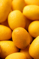 Fresh kumquats fruit texture background