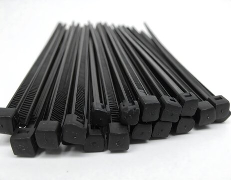 Stack of black plastic cable ties