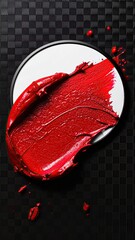 Vibrant red smear on white disk