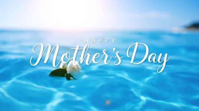 Happy Mother's Day greeting card.  A light blue, blurry, ocean-like background with white script lettering that says "Happy Mother's Day". A small white flower floats on the water's surface