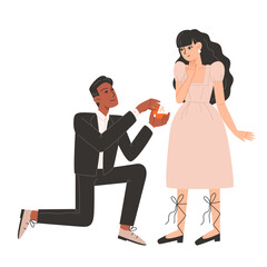 Man proposes to woman with engagement ring