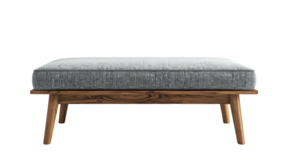 Stylish and modern rectangular ottoman with a light gray upholstered cushion and wooden legs, positioned on a solid black background, offering a sleek and minimalist design aesthetic.