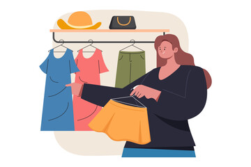 Person choosing clothes from a rack with a skirt