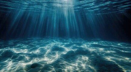 Sunlight pierces a blue underwater scene