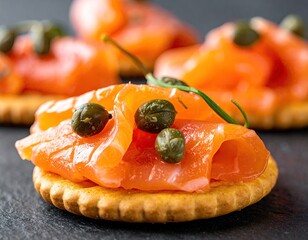 Salmon and capers on crackers