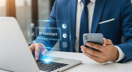 A person in a suit using a laptop and phone with an AI assistant interface.