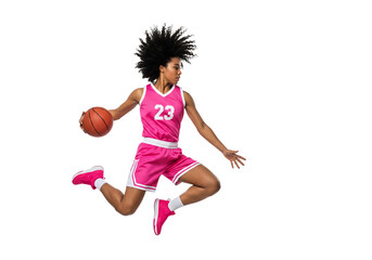 A female basketball player in mid-air dribbling a basketball