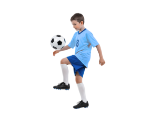 A Young Soccer Player Skillfully Juggling the Ball with His Foot