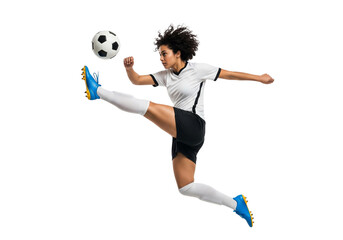A determined female soccer player kicking a ball mid-air during a game. The athlete is wearing a soccer uniform and demonstrates skill and athleticism