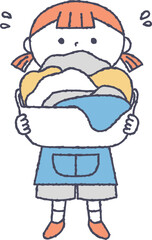 大量の洗濯物を持っている女の子