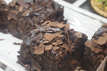 Delicious chocolate dessert with shavings on display