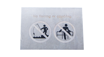 Sign aluminum No fishing or climbing isolated on cut out PNG or transparent background. Warning of prohibited area playing various devices. Regulations must be followed installed along river and fence