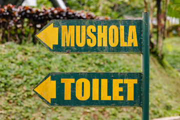 Mushola and toilet sign 