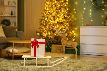 Interior of living room with sled, glowing Christmas tree and presents