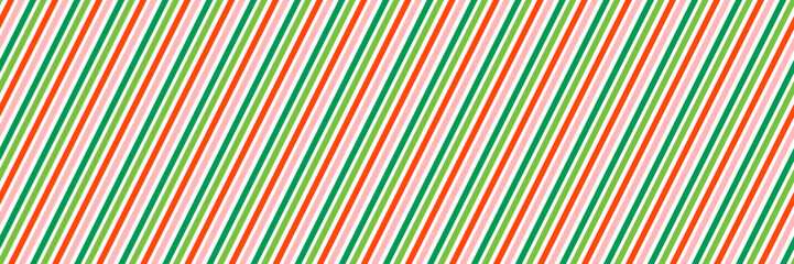 Obraz premium Striped Christmas seamless pattern. Red, green and pink Xmas diagonal line wallpaper. Candy cane peppermint repeated background. Winter holiday present wrapping paper. Vector decoration backdrop