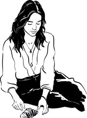 Woman with dark wavy hair sitting and looking at a croissant