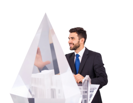 Smiling handsome businessman in a black suit and blue tie.