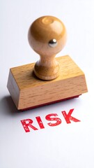 RISK" stamped on white paper