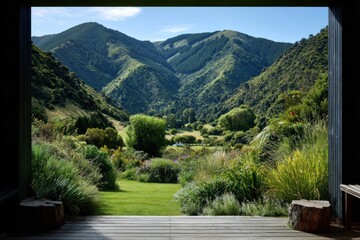 Lush green valley unfolds from a wooden deck, bathed in natural light.