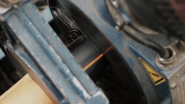 A close-up of the process of facing a plastic gas pipe for welding. The technology for laying plastic gas pipes underground.