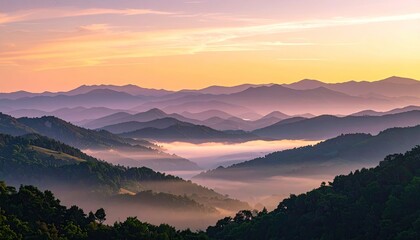 Silhouette Paragliders Against Orange Sunset Sky Over Misty Mountain Landscape with Layered Hills and Forest Trees in Twilight